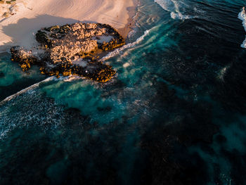 High angle view of rocks on beach