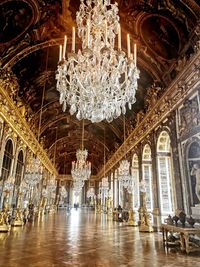 Illuminated chandelier in building