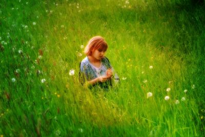 Girl on grassy field