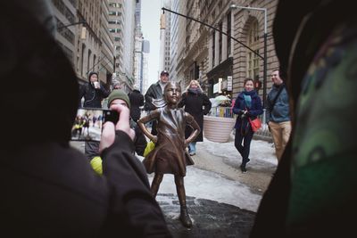 People on street in city