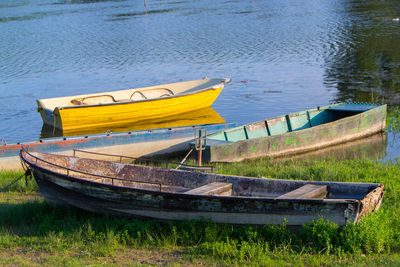 Boat moored at lakeshore