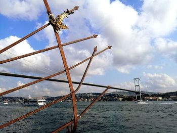 Bridge over sea against sky