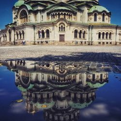 Reflection of building in water