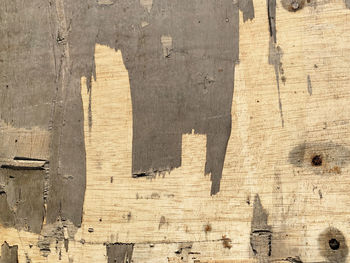 Background texture and shape of peeling plywood