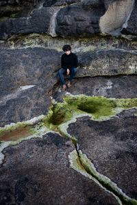 Full length of man on cliff