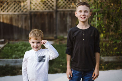 Portrait of two happy young brothers smiling