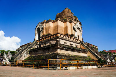 Low angle view of temple against blue sky