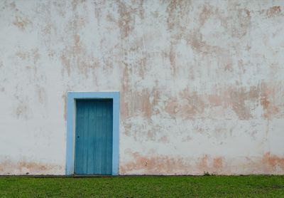 View of closed blue door