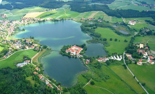 High angle view of river amidst agricultural landscape