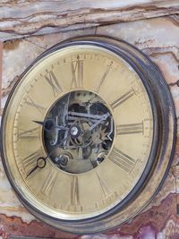 Close-up of clock on wall