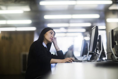 Young asia woman with paper in an office working