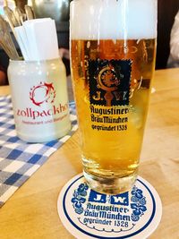 Close-up of beer glass on table