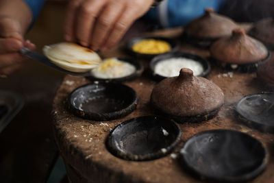 Midsection of person preparing food