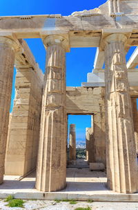 Entrance of propyleum, architectural details of ancient temple on acropolis hill, athens