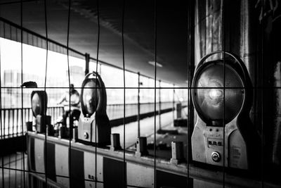 Reflection of people on glass window