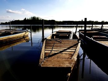 Pier on lake against sky