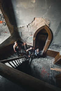High angle view of people on staircase in building
