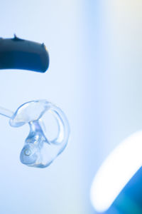 Close-up of water drop on white background