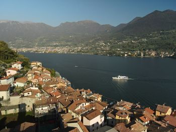 High angle view of townscape by sea