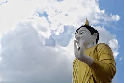 Low angle view of statue against sky