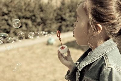 Portrait of woman drinking water