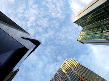 Low angle view of skyscrapers against sky