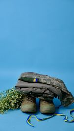 Low angle view of statue against clear blue sky