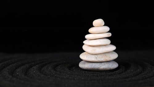 Stack of stones on table