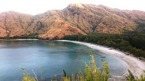 Scenic view of lake by mountains