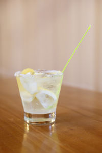 Close-up of cocktail on wooden table