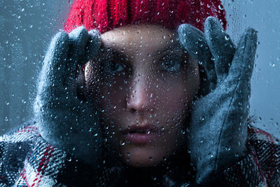Close-up portrait of woman during winter