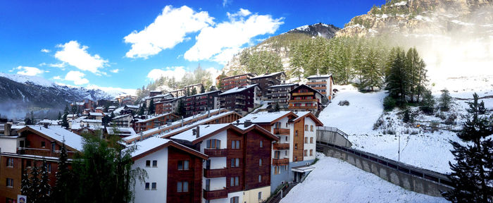 Buildings against sky during winter