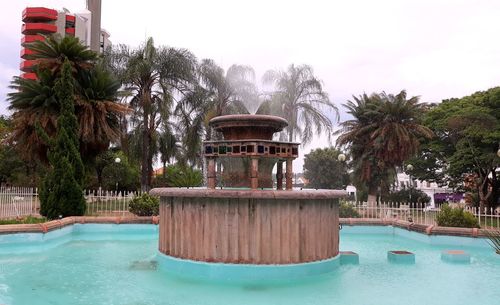 View of swimming pool in front of building