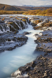 Surface level of stream flowing in water