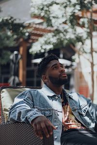 Young man looking away outdoors