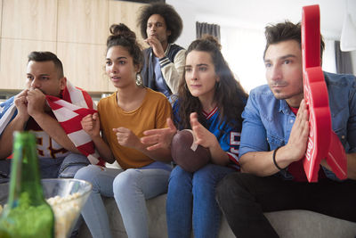 Group of people looking at friends