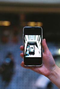 Close-up of hand holding smart phone