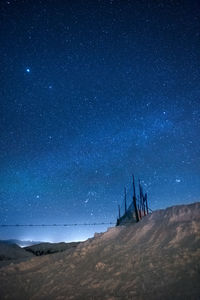 Scenic view of sea against sky at night