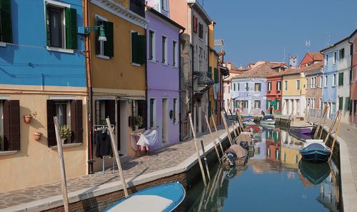Canal amidst buildings in town