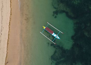 High angle view of boat sailing on sea