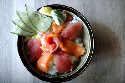 High angle view of chirashi sashimi in bowl on table