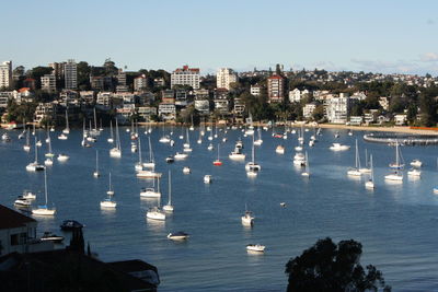 High angle view of boats in city