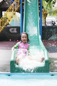 Girl playing in playground