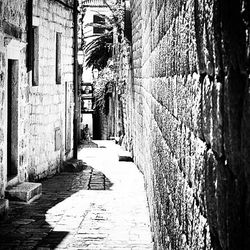 Narrow alley along buildings