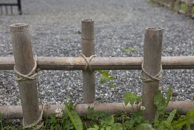 High angle view of wooden post on field