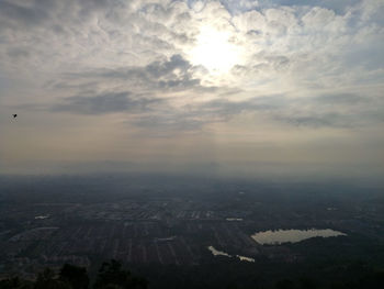 Aerial view of city against sky