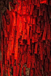 Full frame of red lanterns hanging on wall
