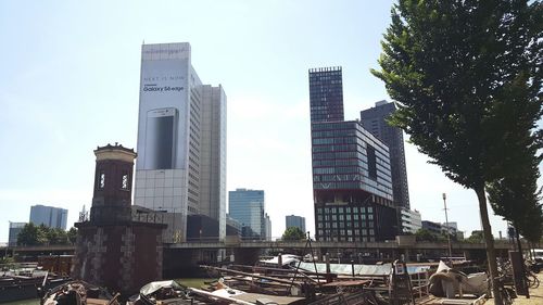 Low angle view of modern buildings against sky