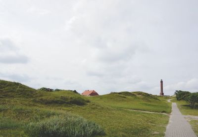 View of landscape against cloudy sky