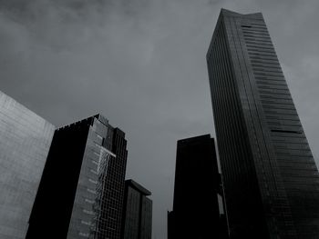 Low angle view of modern buildings against sky